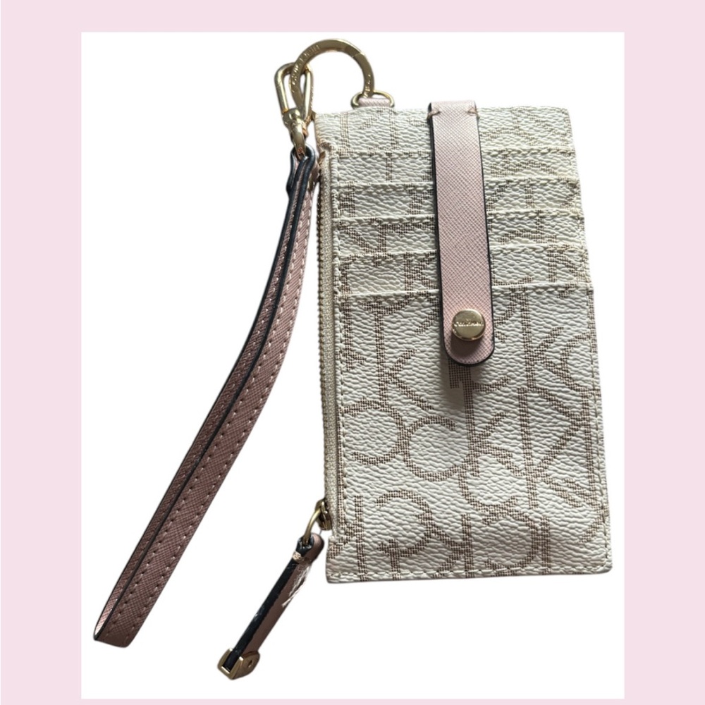 EUC / Calvin Klein Pink Wristlet with Gold Accents